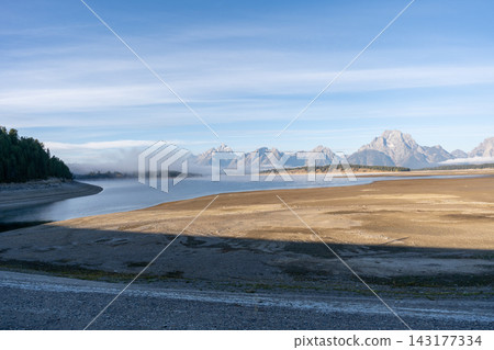 A stunning view of the Teton mountain range in Grand Teton National Park, WY. A stunning view of the Teton mountain range in Grand Teton National Park, WY. 143177334