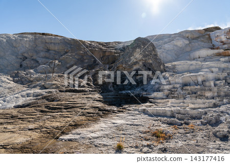 Views of Mammoth Hot Springs on a sunny day at Yellowstone National Park. Views of Mammoth Hot Springs on a sunny day at Yellowstone National Park. 143177416