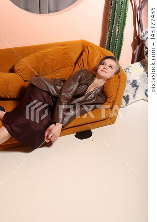 Peaceful woman with natural decor and soothing ambiance Peaceful woman with natural decor and soothing ambiance 143177435