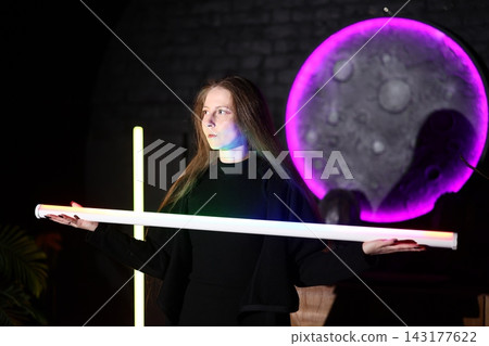 Elegant female performs tranquil occult ritual in artful studio setting Elegant female performs tranquil occult ritual in artful studio setting 143177622