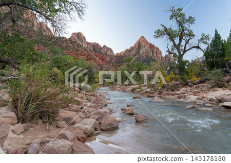 A beautiful view of the Virgin river and red rocks down in the Zion valley. A beautiful view of the Virgin river and red rocks down in the Zion valley. 143178180