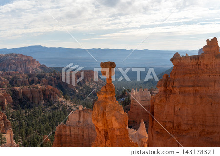 A beautiful view of Thor's Hammer hoodoo in golden hour light in Bryce Canyon. A beautiful view of Thor's Hammer hoodoo in golden hour light in Bryce Canyon. 143178321