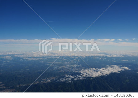 The end of summer, the blue sky and horizon stretching above the clouds The end of summer, the blue sky and horizon stretching above the clouds 143180363
