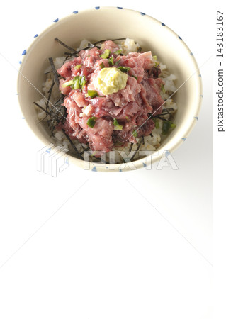 A tuna bowl photographed against a white background. A tuna bowl photographed against a white background. 143183167