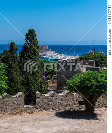 View of Mandraki Harbor and Saint Nicholas Fortress from Rhodes City Walls View of Mandraki Harbor and Saint Nicholas Fortress from Rhodes City Walls 143185715