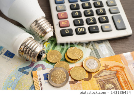 Cost of electric utilities with light bulb for payment. Cost of electric utilities with light bulb for payment. 143186454