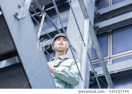 Workers working at a construction site. Photo courtesy of Denpa Gakuen, Tokyo Electronics College. Workers working at a construction site. Photo courtesy of Denpa Gakuen, Tokyo Electronics College. 143187744