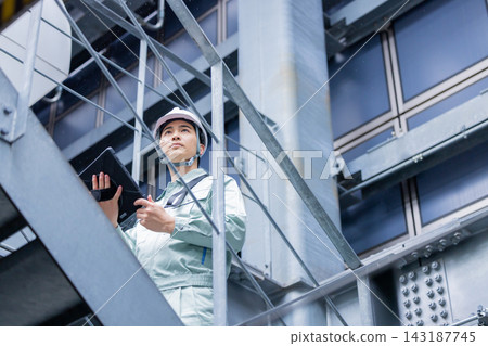 Workers working at a construction site. Photo courtesy of Denpa Gakuen, Tokyo Electronics College. Workers working at a construction site. Photo courtesy of Denpa Gakuen, Tokyo Electronics College. 143187745
