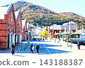 Red brick warehouses bustling with tourists 143188387