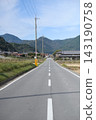 A straight country road 143190758