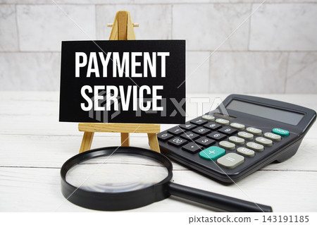 Payment Service text with calculator and magnifying glass 143191185