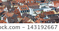 Scenic aerial view patchwork of Heidelberg red rooftops tiled roofs historical colorful houses medieval old city German Baden-Wurttemberg. Abstract texture charm historic old town architecture 143192667