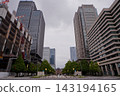 View of Tokyo Station and the surrounding skyscrapers from a main street in the Hibiya/Marunouchi area. 143194165