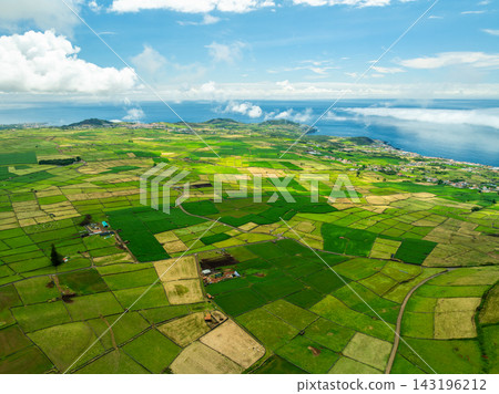 Green Lush Patchwork Fields Sunny Day. Terceira Island, Azores Green Lush Patchwork Fields Sunny Day. Terceira Island, Azores 143196212