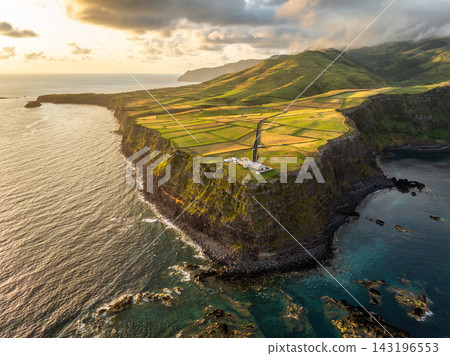 Golden Sunrise over Farol do Albarnaz Lighthouse, Flores Island, Azores Golden Sunrise over Farol do Albarnaz Lighthouse, Flores Island, Azores 143196553