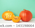 Sliced Hokkaido pumpkin on mint background. 143198664