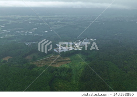 Aerial photograph capturing a large complex of facilities and forests in Ebino City, Miyazaki Prefecture. Aerial photograph capturing a large complex of facilities and forests in Ebino City, Miyazaki Prefecture. 143198890