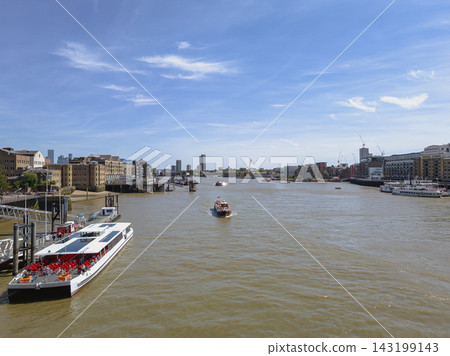 Scenic View of the River Thames with Boats in London, England Scenic View of the River Thames with Boats in London, England 143199143