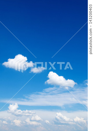 Blue sky background with tiny clouds Blue sky background with tiny clouds 143200403