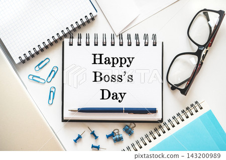 Happy Boss's Day. Desk with a calendar, notebook, and pen Happy Boss's Day. Desk with a calendar, notebook, and pen 143200989