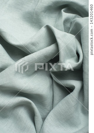 Draped Mint Green Linen Fabric Macro Texture Close Up Draped Mint Green Linen Fabric Macro Texture Close Up 143201460