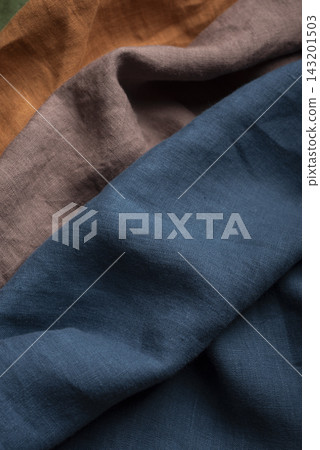 Draped Teal Blue Linen Fabric Texture Macro Close Up Draped Teal Blue Linen Fabric Texture Macro Close Up 143201503