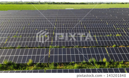 Solar farm generating clean renewable energy from photovoltaic panels across rural landscape, promoting sustainable powerful future Solar farm generating clean renewable energy from photovoltaic panels across rural landscape, promoting sustainable powerful future 143201848