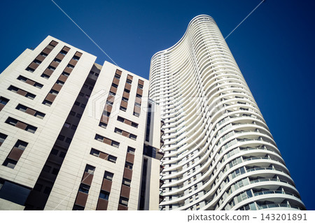 Modern urban skyline featuring a dense cluster of high-rise corporate architecture in Tel Aviv Modern urban skyline featuring a dense cluster of high-rise corporate architecture in Tel Aviv 143201891
