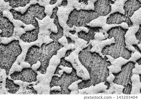 Detailed grey stucco plaster wall texture background with relief pattern Detailed grey stucco plaster wall texture background with relief pattern 143203404