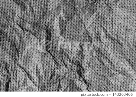 Detailed crumpled light grey paper background texture with geometric folds Detailed crumpled light grey paper background texture with geometric folds 143203406
