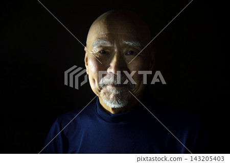 Close-up of a smiling elderly person Close-up of a smiling elderly person 143205403