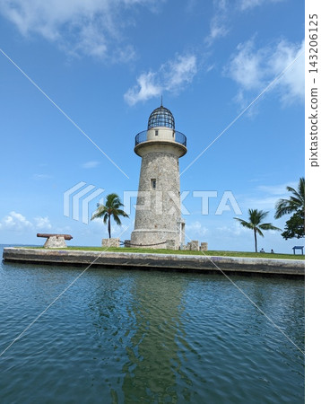 Historic Boca Chita Lighthouse Nestled in Tropical Scenery in Biscayne, Florida. Historic Boca Chita Lighthouse Nestled in Tropical Scenery in Biscayne, Florida. 143206125