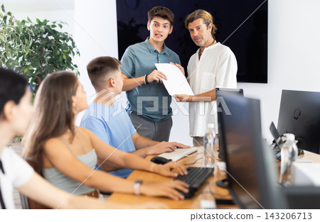 Among students of computer courses, male teacher awards diploma and to excellent guy pupil Among students of computer courses, male teacher awards diploma and to excellent guy pupil 143206713