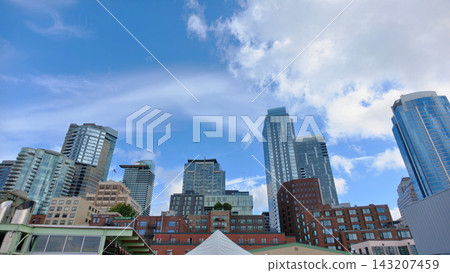 Modern Downtown Seattle Skyline Under Blue Sky Modern Downtown Seattle Skyline Under Blue Sky 143207459