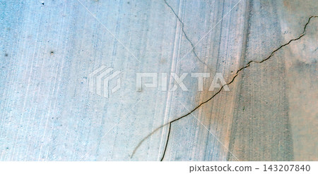 Light blue cracked concrete wall texture background 143207840