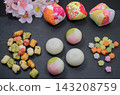 Dumplings, rice crackers, and konpeito candy for the Hina Matsuri festival. 143208759