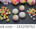 Dumplings, rice crackers, and konpeito candy for the Hina Matsuri festival. 143208762