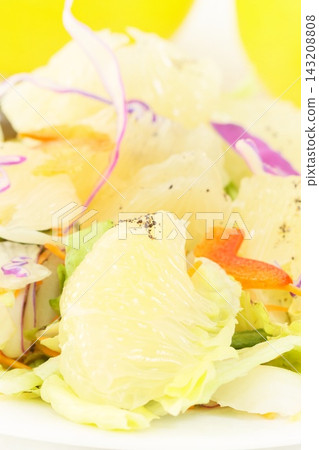 Salad using Tosa Buntan (buntan) on a bright background Salad using Tosa Buntan (buntan) on a bright background 143208808