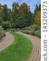Curved Brick Garden Path in Autumn 143209373