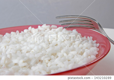 groats in plate on white groats in plate on white 143210289