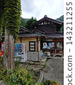Thatched roof town 143211255