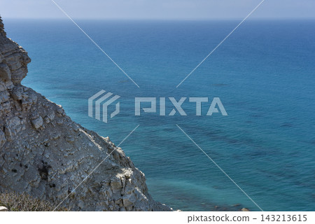 White limestone cliffs and calm blue waters of the Mediterranean Sea, Cyprus White limestone cliffs and calm blue waters of the Mediterranean Sea, Cyprus 143213615