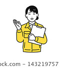 A young woman in work clothes smiles as she gives directions. 143219757