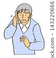 An elderly man is confused on the phone. 143220666
