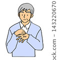 An elderly man applying cream. 143220670