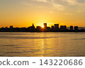A view of the sunrise over Port Island at Kobe Port, Chuo Ward, Kobe City. 143220686