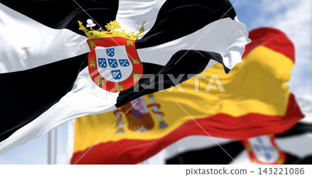 Ceuta and spanish national flags waving on a clear day Ceuta and spanish national flags waving on a clear day 143221086