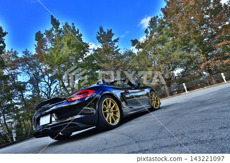 A gleaming black Porsche Boxster Spyder A gleaming black Porsche Boxster Spyder 143221097