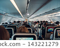 Crowded Airplane Cabin Interior 143221279