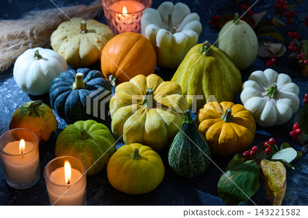 Pumpkins illuminated by moonlight - Halloween image Pumpkins illuminated by moonlight - Halloween image 143221582